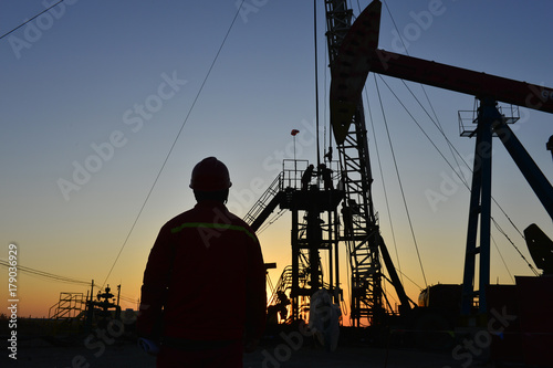 field oil workers at work