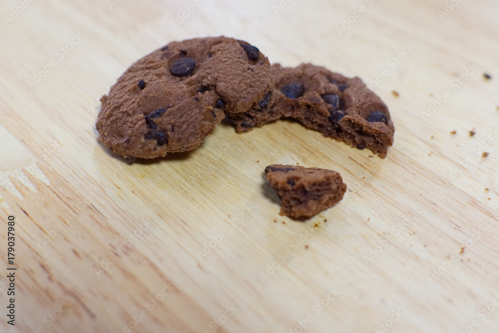 Chocolate cookies on wooden table. Chocolate chip cookies. Chocolate cookies on wooden table. Chocolate chip cookies.