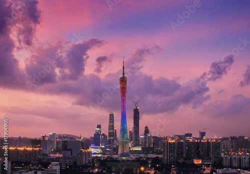 Illuminated Canton Tower and skyscrapers at dusk, Guangzhou, China photo