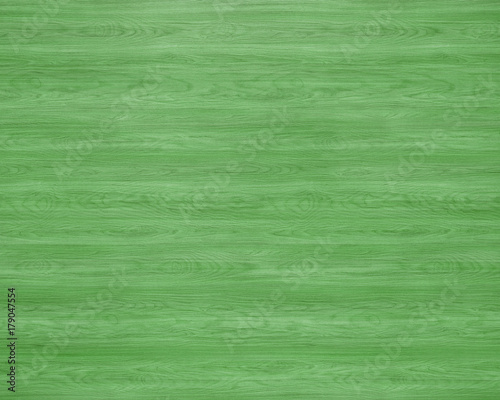 Green colored wood. Green wood texture background.