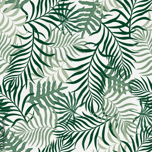 Tropical background with palm leaves. Seamless floral pattern