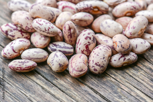 Beans on wooden background