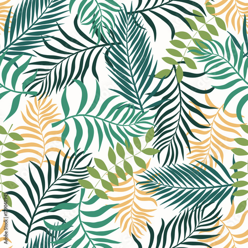 Tropical background with palm leaves. Seamless floral pattern