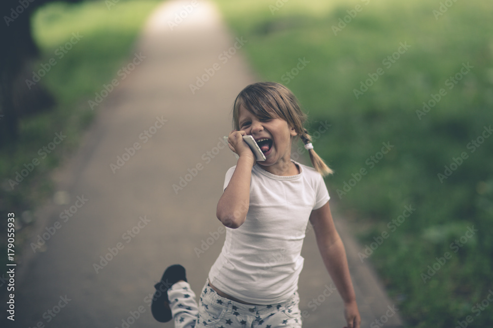 girl child with smartphone, childhood technology girl child with smartphone, childhood technology