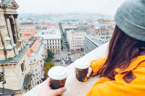 two cups of coffe panormaic view to old european city photo