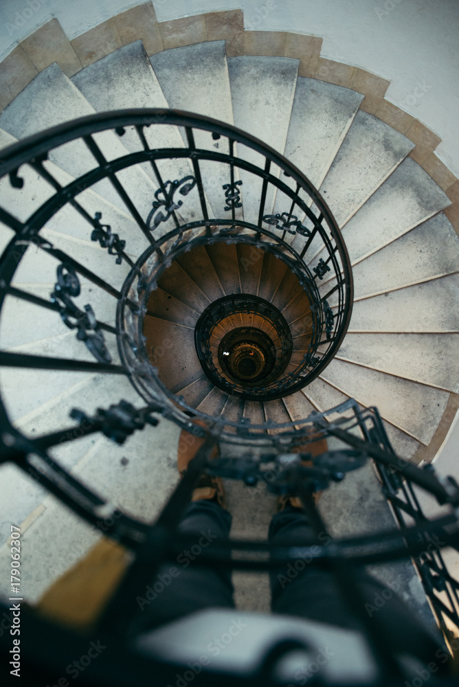Fototapeta premium spiral stairs in old house