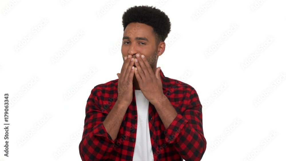 portrait of kind smiling man with african hairdo showing symbols of tree wise monkeys - see no evil, hear no evil, speak no evil poses isolated over white background. Concept of emotions portrait of kind smiling man with african hairdo showing symbols of tree wise monkeys - see no evil, hear no evil, speak no evil poses isolated over white background. Concept of emotions