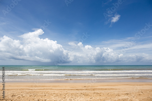 Beautiful beach and ocean with blue sky and whit cloud