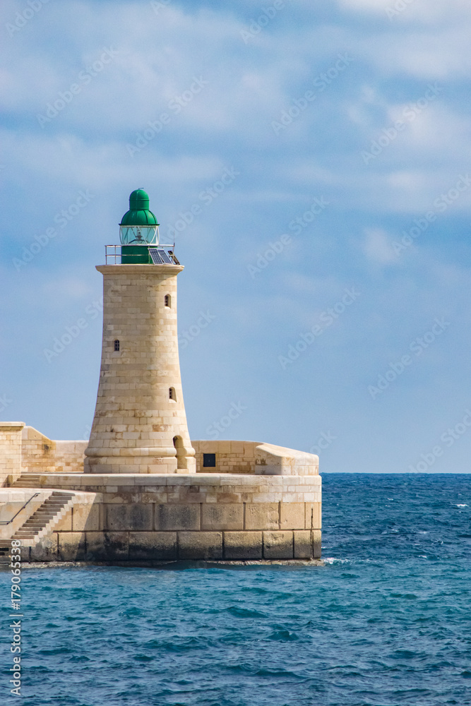 Lighthouse of the breakwater in Valletta, Malta