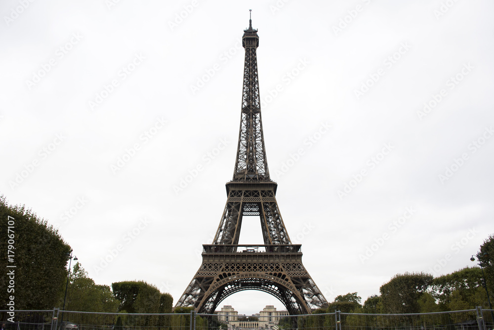Eiffel Tower or Tour Eiffel  is a wrought iron lattice tower on the Champ de Mars in Paris, France