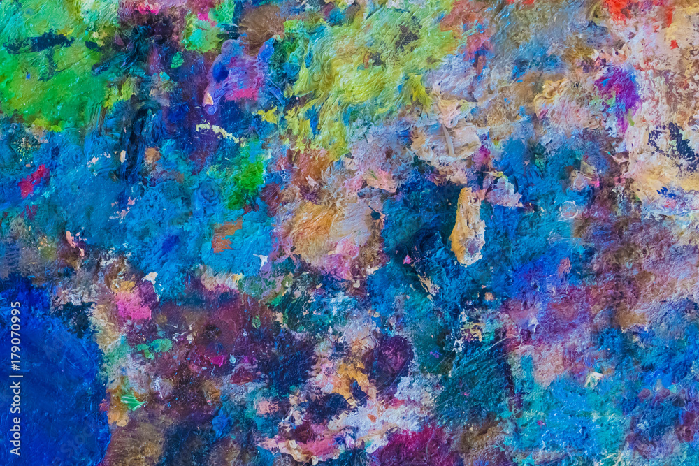 Abstract colorful stains of oil paint on canvas, background, texture