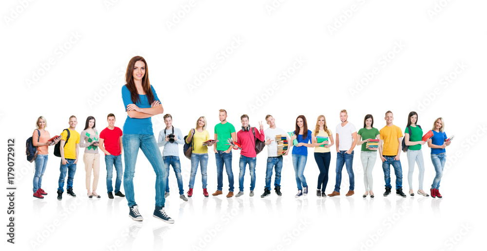 Large group of teenage students isolated on white background. Many different people standing together. School, education, college, university concept.