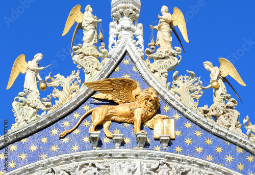 winged lion in gold on the Basilica of Saint Mark in Venice