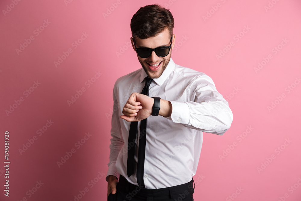 Portrait of a smiling attractive man in white shirt Portrait of a smiling attractive man in white shirt