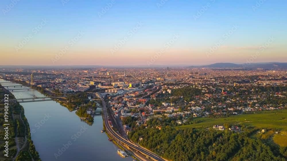 aerial shot of vienna city at sunrise flying over danube river nussdorf area aerial shot of vienna city at sunrise flying over danube river nussdorf area