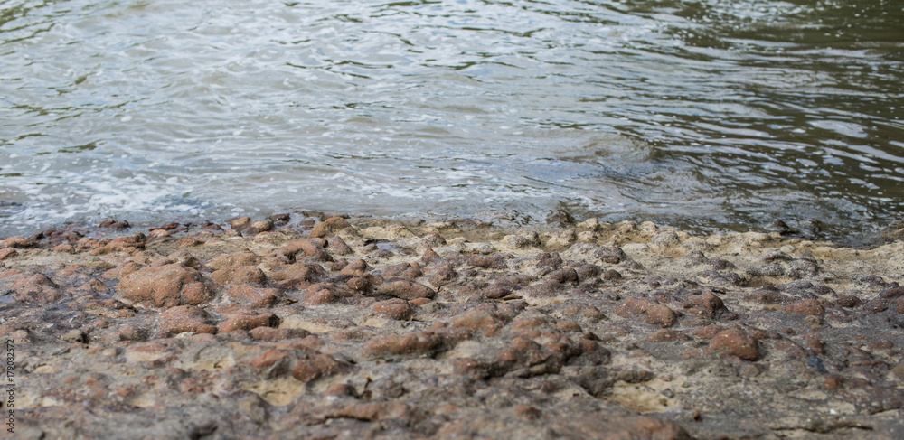 The river from the red stone of volcanic formation. The river from the red stone of volcanic formation.
