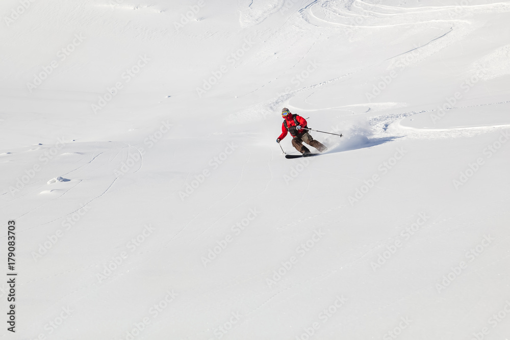 Skiing in the snowy mountains.