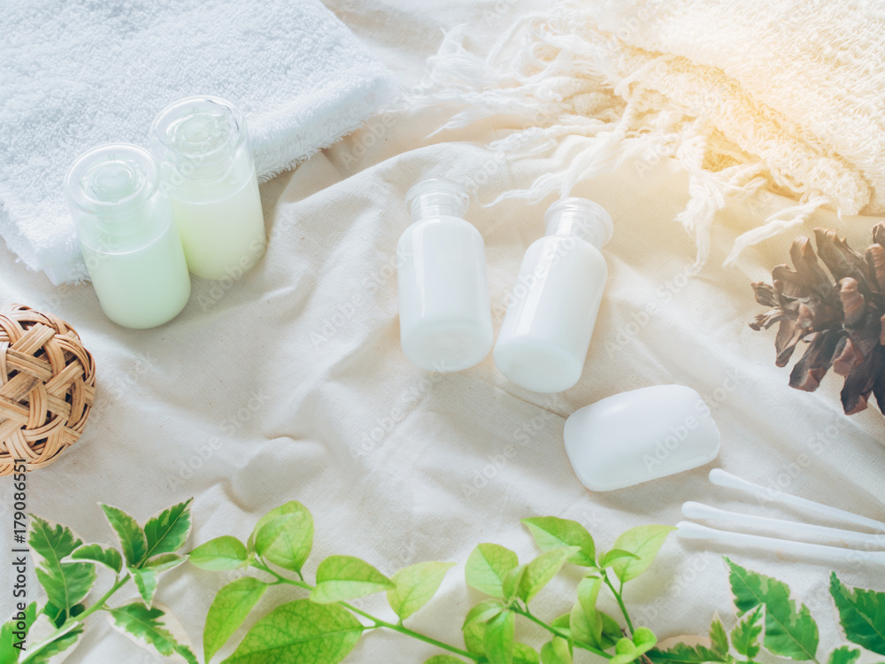 Bathroom accessories. Shower gel, body lotion, shampoo on fabric background for the bath. Bathroom accessories. Shower gel, body lotion, shampoo on fabric background for the bath.