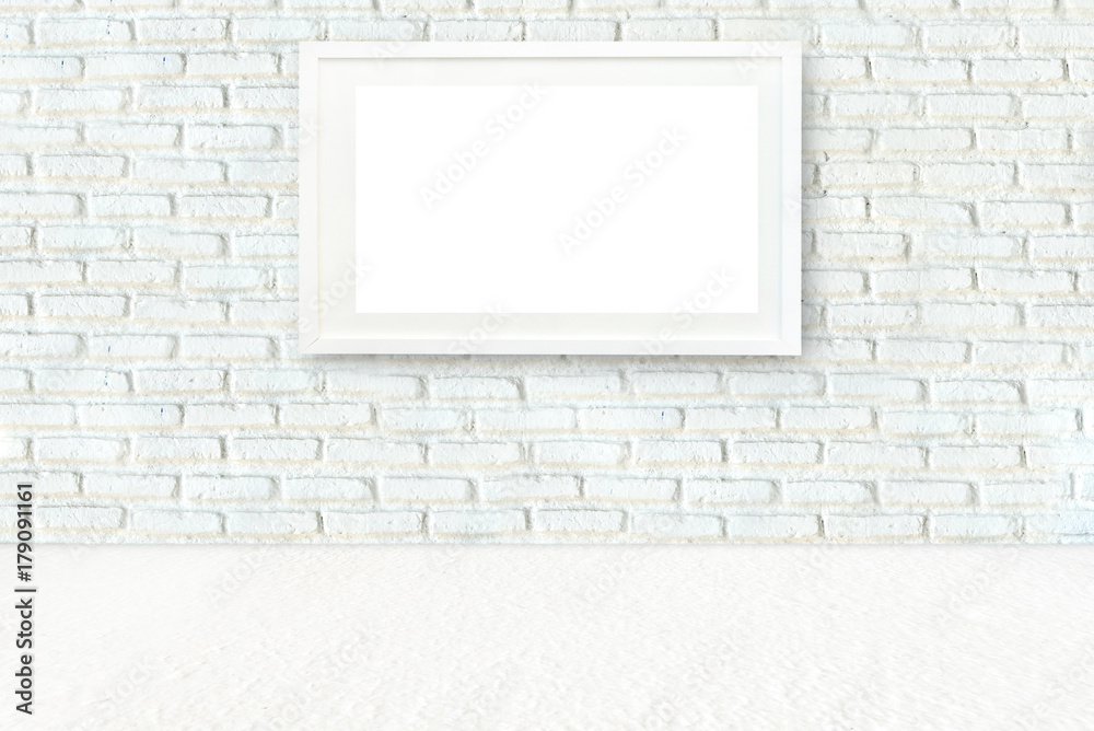 Empty room with picture frame on the white wall.