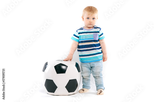 little fan with a soccer ball