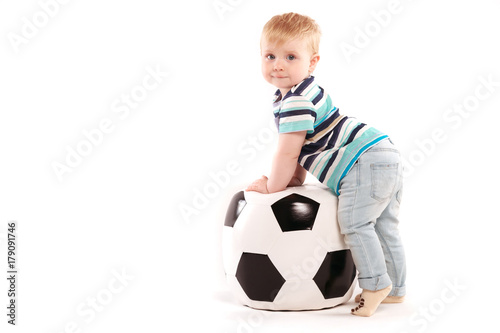 child with big soccer ball © Ivan Traimak