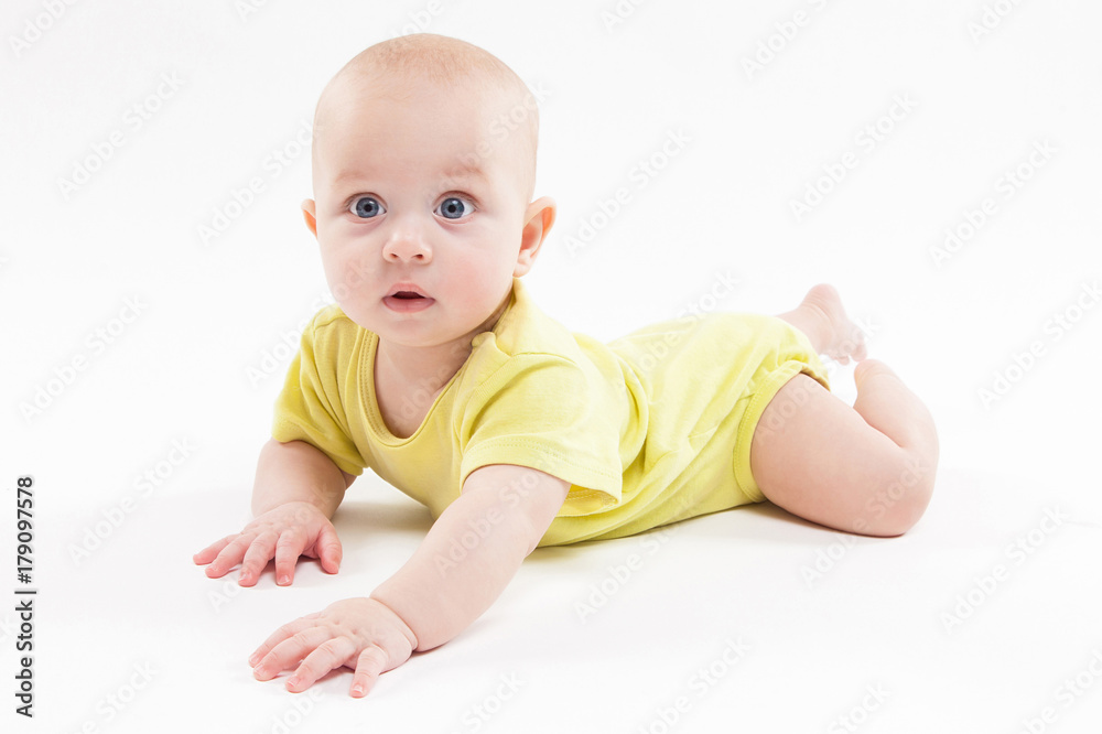 cute baby lying on the background and smiling cute baby lying on the background and smiling
