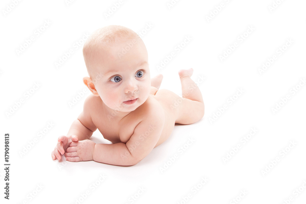 naked baby on a white background smiling and looking at the camera naked baby on a white background smiling and looking at the camera