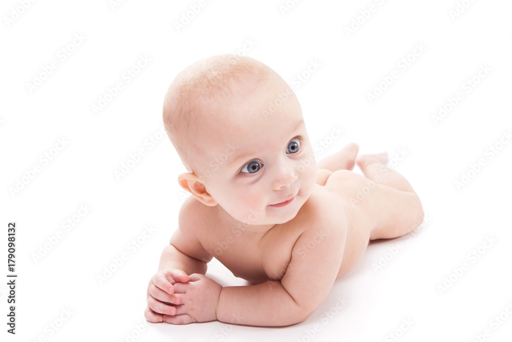 naked baby on a white background smiling and looking at the camera naked baby on a white background smiling and looking at the camera