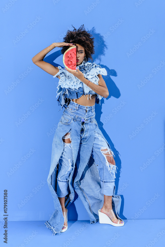 model posing with watermelon slice model posing with watermelon slice