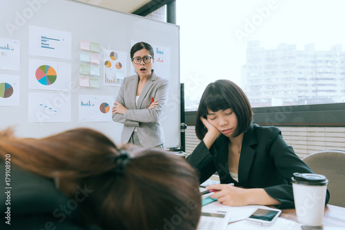 young company business woman looking at employees