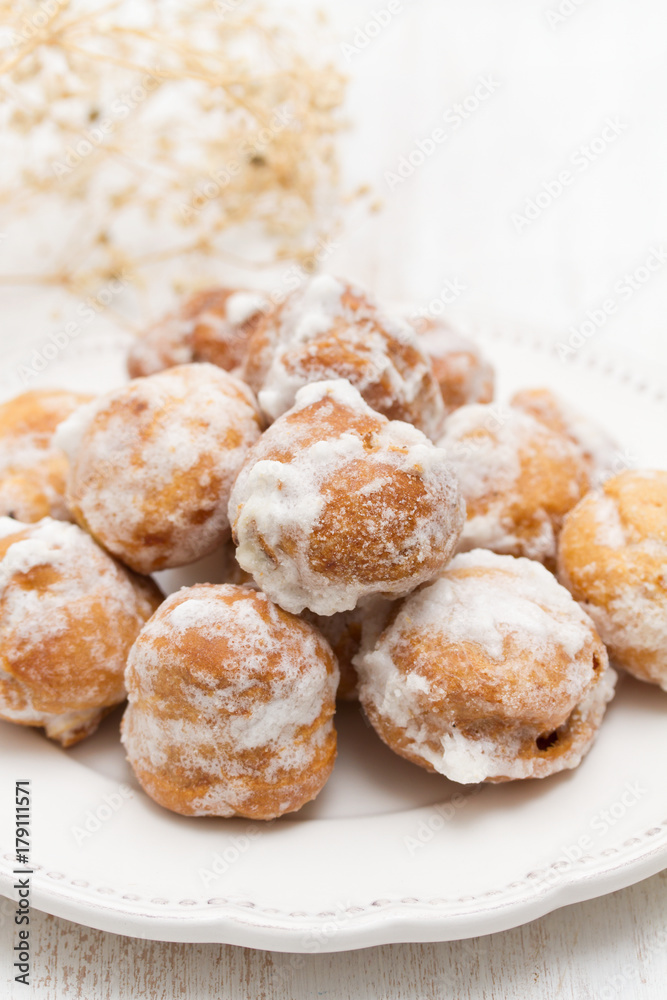 portuguese sweets cavacas on white plate on wooden background portuguese sweets cavacas on white plate on wooden background