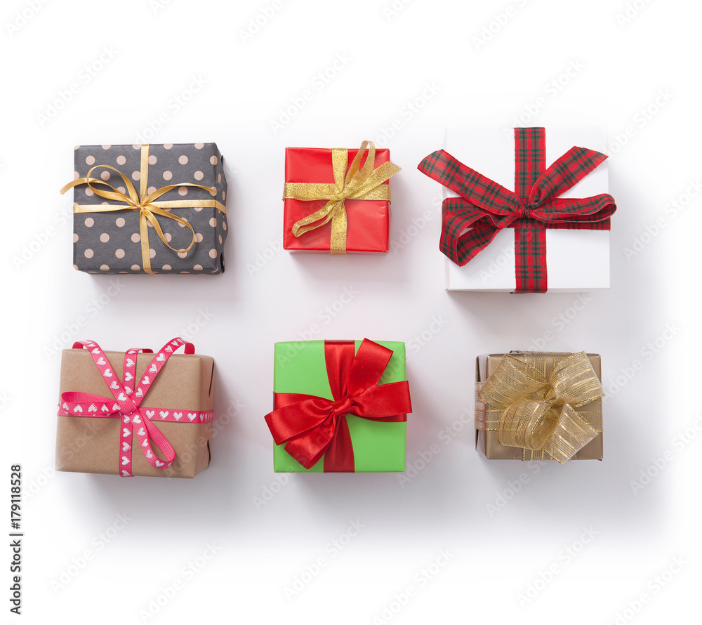 Gift boxes on white background top view. Wedding invitation, greeting card for Mother's. Many gifts and surprises of gifts for Christmas, holiday. Gift boxes on white background top view. Wedding invitation, greeting card for Mother's. Many gifts and surprises of gifts for Christmas, holiday.
