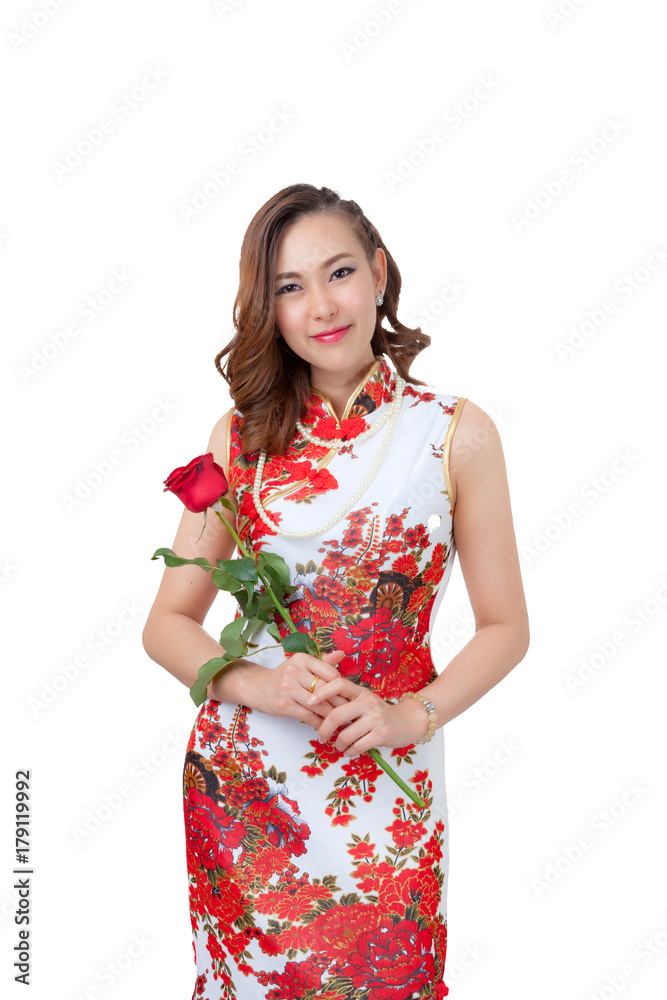 Chinese woman in cheongsam with rose. Chinese woman in cheongsam with rose.
