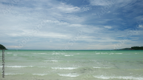 sea beach with blue sky and clouds