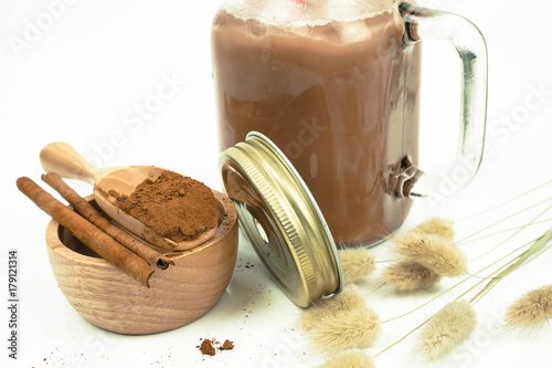 Wallpaper Mural chocolate milk or cocoa with chocolate or cocoa ground beans on white background Torontodigital.ca