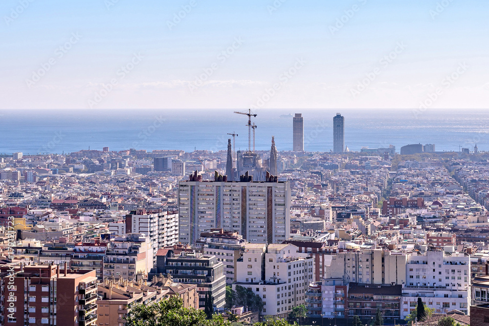Barcelona city View from Park Guell at sunrise. Beautiful blue sky