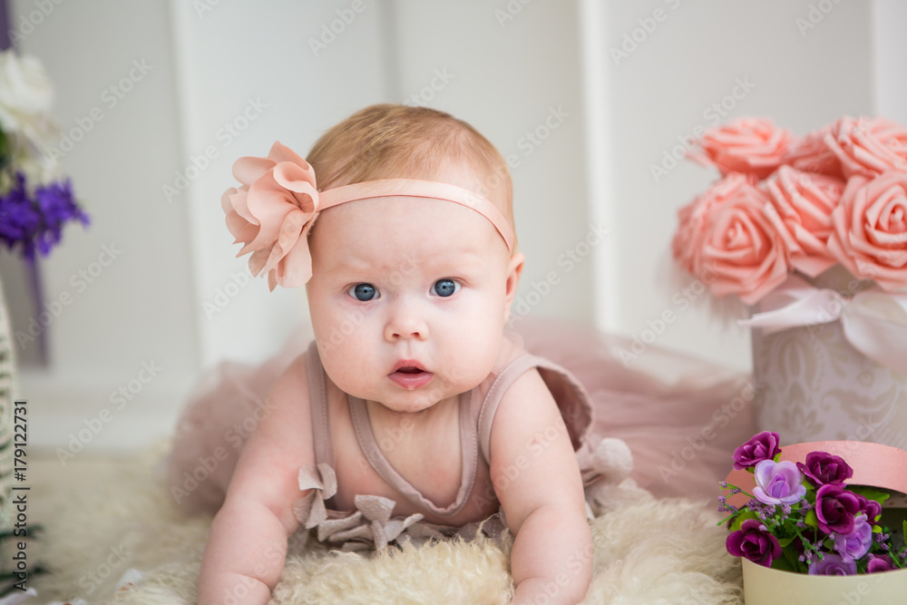 Little baby girl in a beautiful dress Little baby girl in a beautiful dress