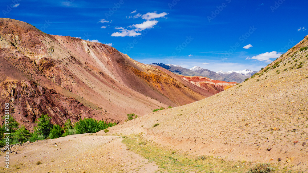 Kyzyl-Chin Valley (other name is Mars), is a picturesque desert terrain in the Altai Mountains, Russia. It is formed with multi-colored clays, composing the fantastic Martian lanscape.
