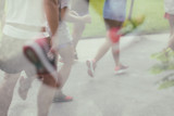 Double exposure - Marathon running race people competing.