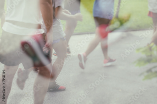 Double exposure - Marathon running race people competing.