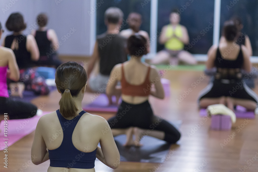 Women asian exercising in fitness studio yoga classes Women asian exercising in fitness studio yoga classes