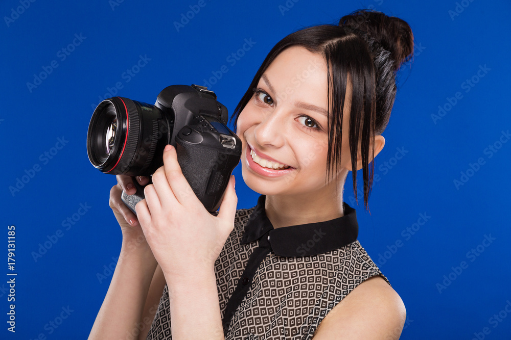 girl holds the camera in hands girl holds the camera in hands