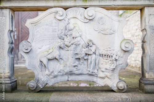 Ornaments, moldings, gargoyle, low reliefs in a sandstone, granite, concrete. sculpting details in Gdansk (Danzig).  Mariacka street (Mariengasse). photo