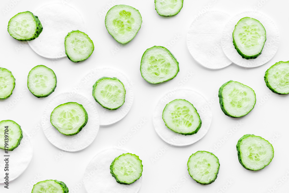 Cucumber cosmetics pattern. White background top view copyspace Cucumber cosmetics pattern. White background top view copyspace