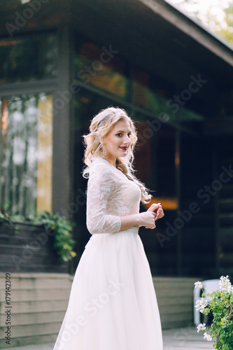 Beautiful blonde bride in vintage dress. Artwork