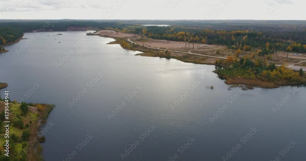 Amazing aerial autumn landscape, forests with lake, Fall colors, Aerial footage. Aerial footage of lake and forest around. Autumn landscape.
