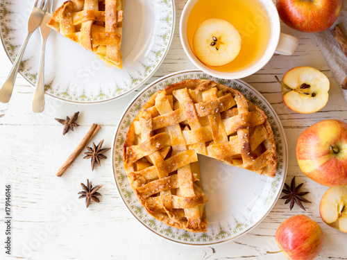 Apple pie pastry and hot tea in autumn season.