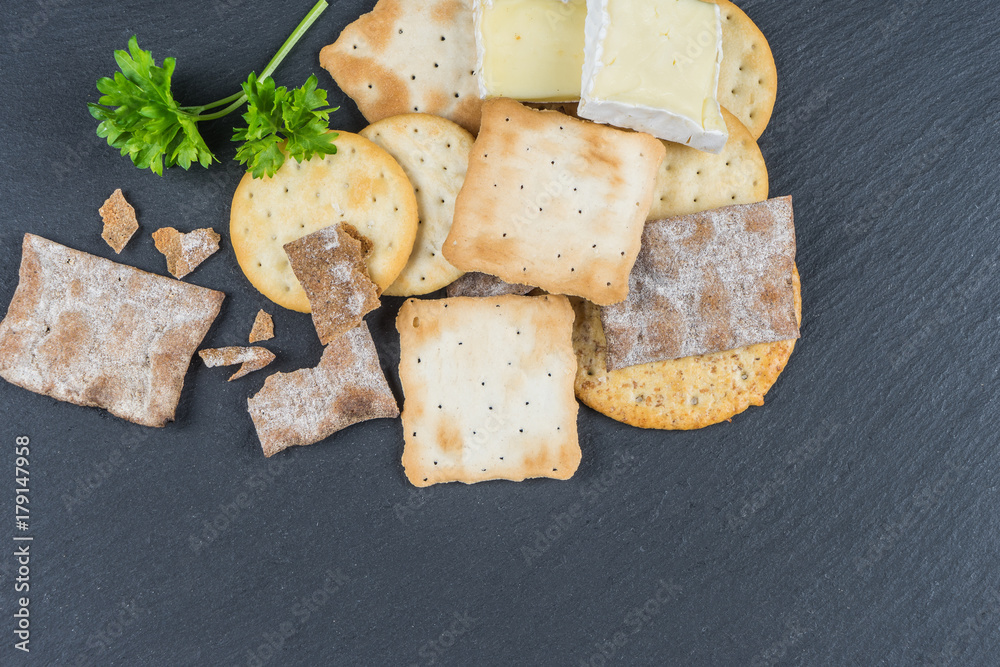 Fototapeta premium Dry cracker cookies with black background