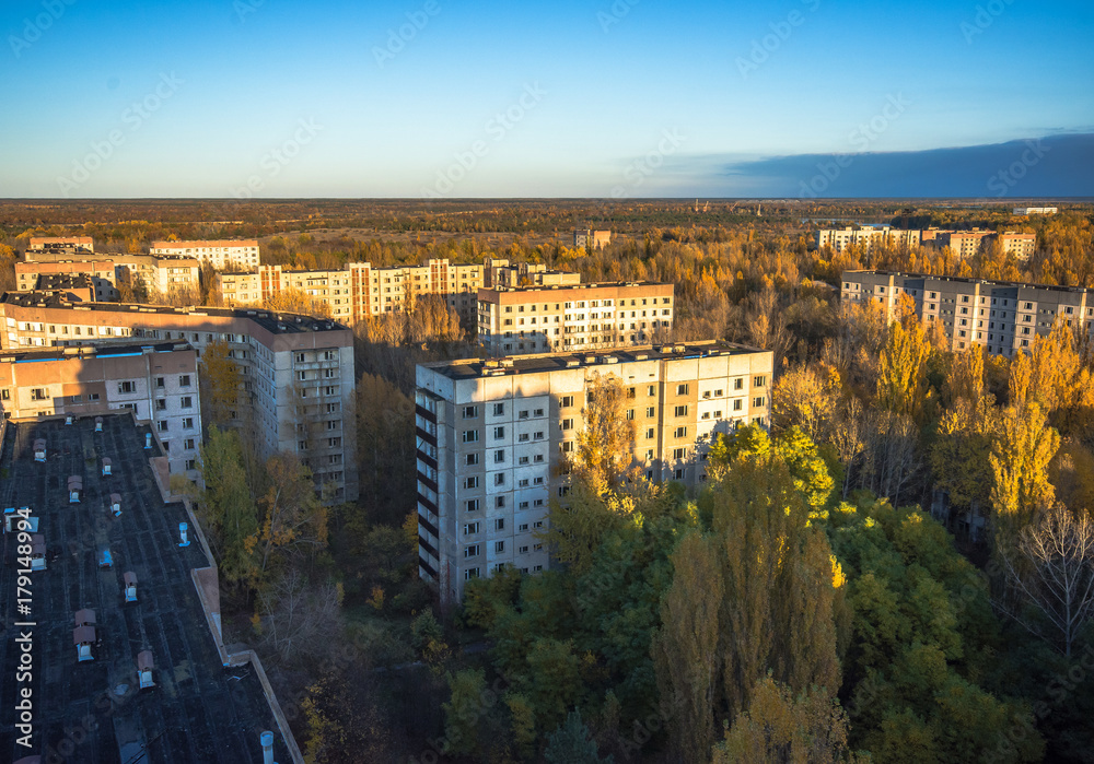 Fototapeta premium Aerial view of abandoned Pripyat city in Chernobyl Exclusion Zone at autumn time
