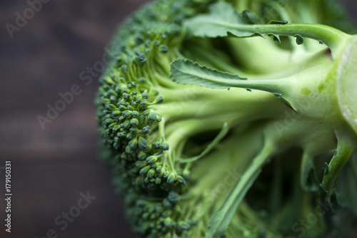 Fresh broccoli on the wooden table, closeup